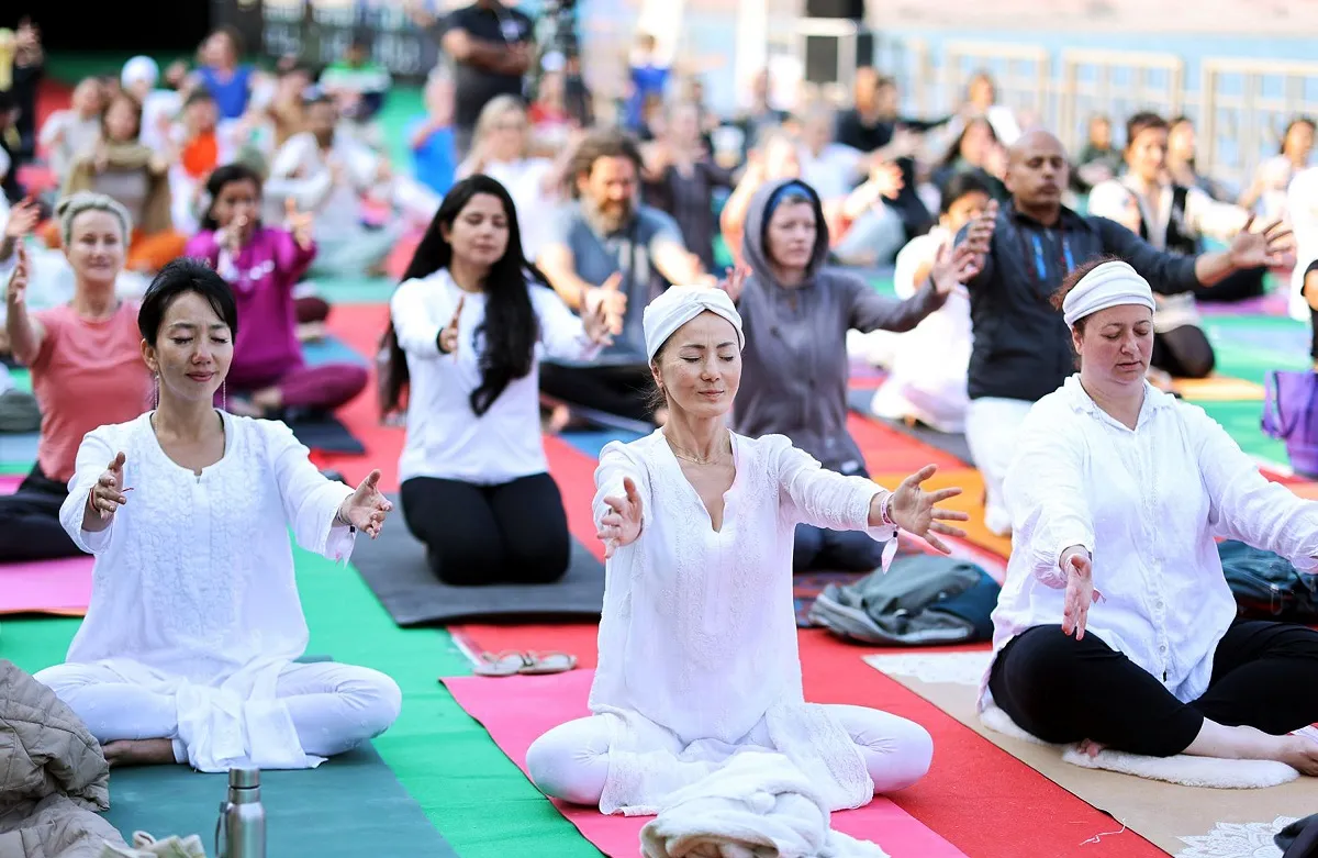 Foreigners perform Yoga during the 35th International Yoga Festival at  Parmarth Niketan - TheDailyGuardian