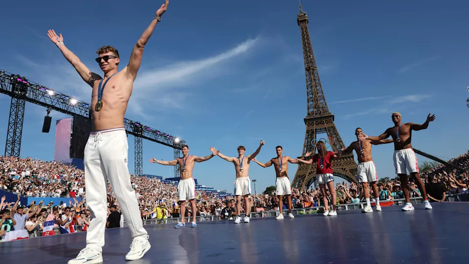 Paris 2024 Olympics | Léon Marchand shirtless, blazing sun, multiple  celebrations: a look back at the Champions Park parade in pictures