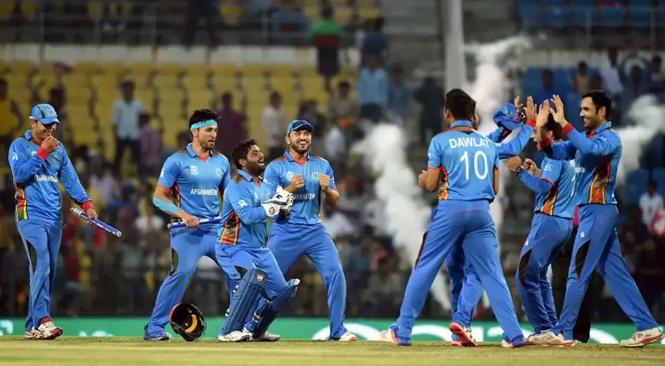 Afghanistan players celebrate their historic win