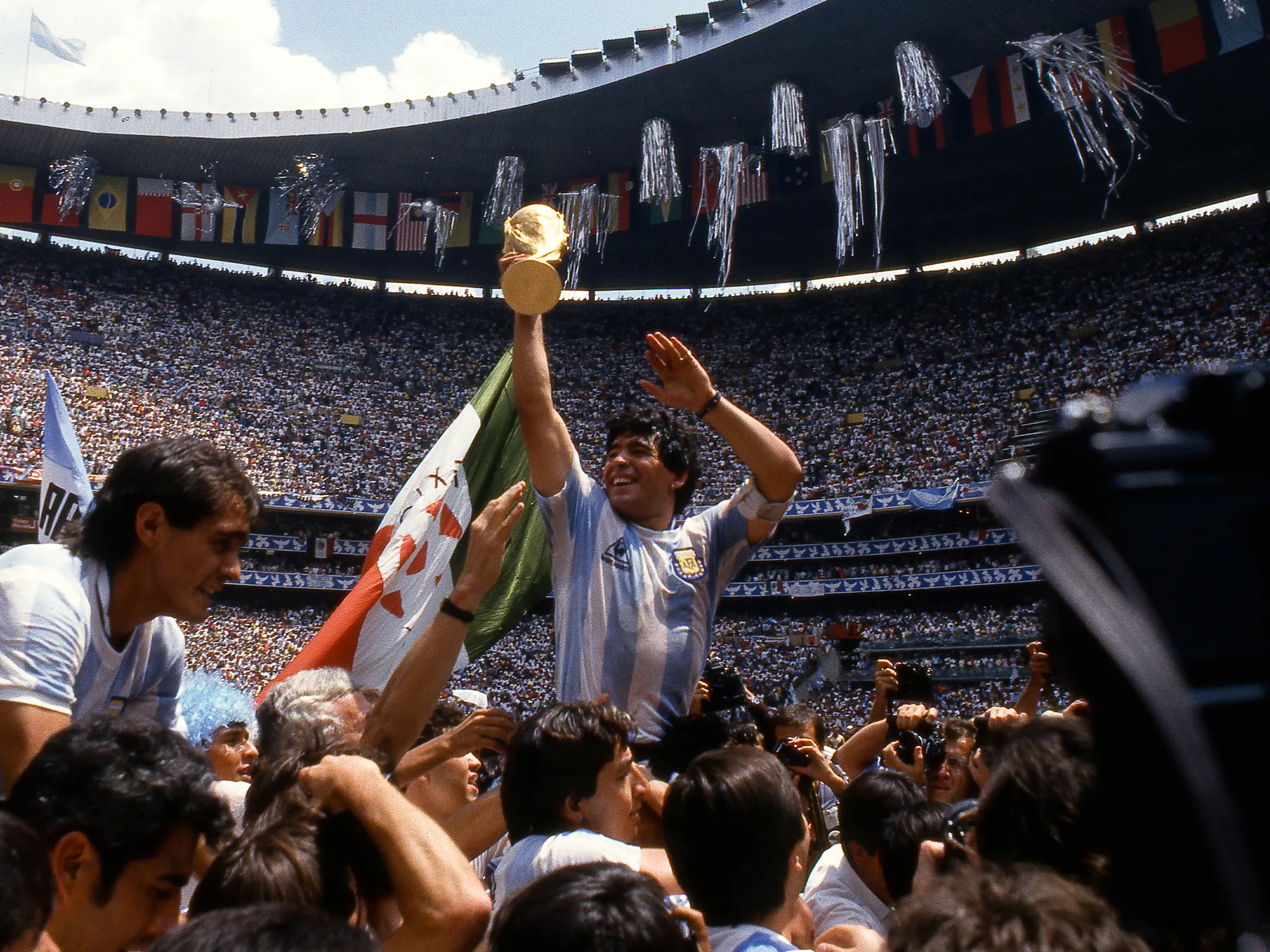 Diego Maradona lifting the 1986 World Cup title