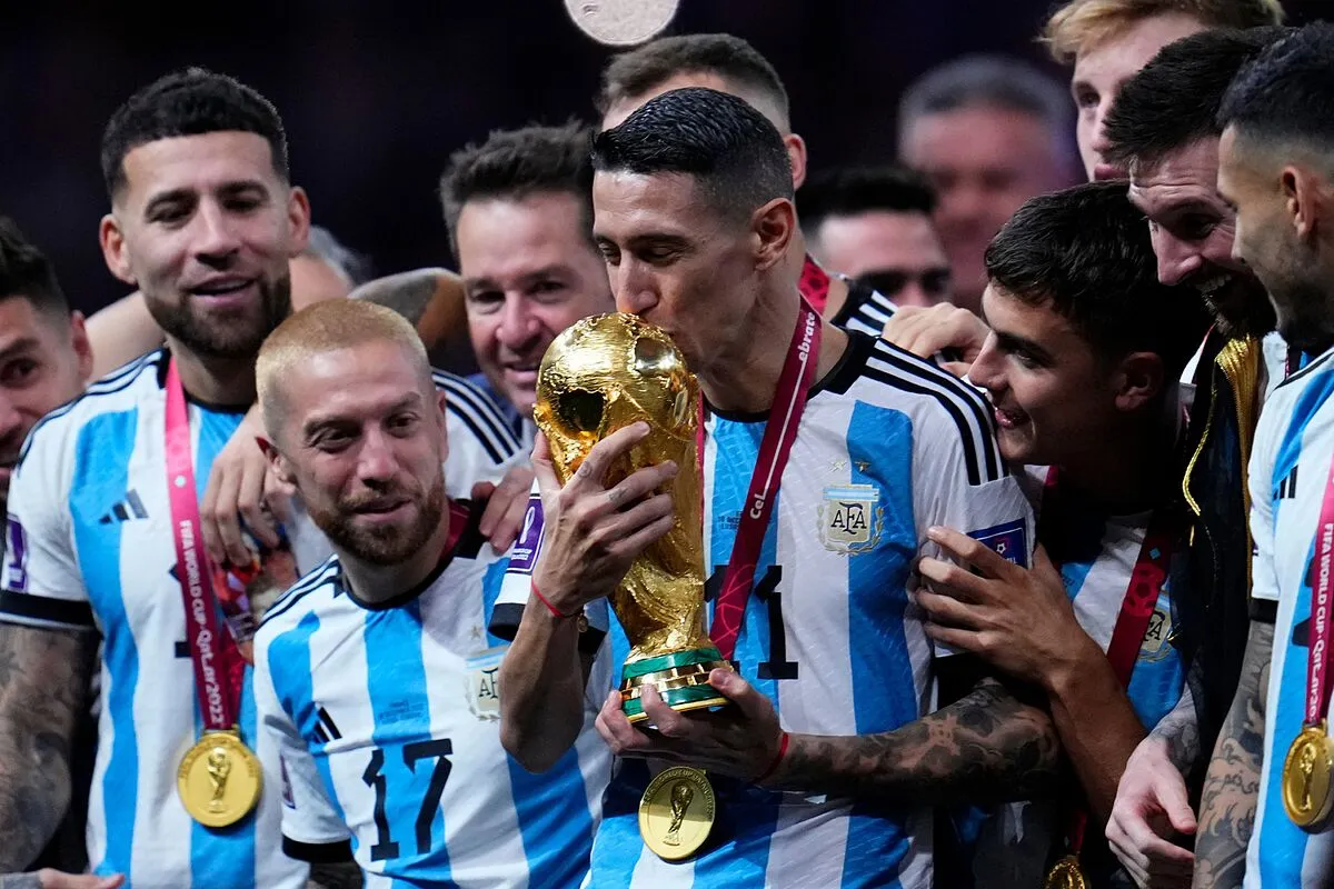 Di Maria with the World Cup trophy