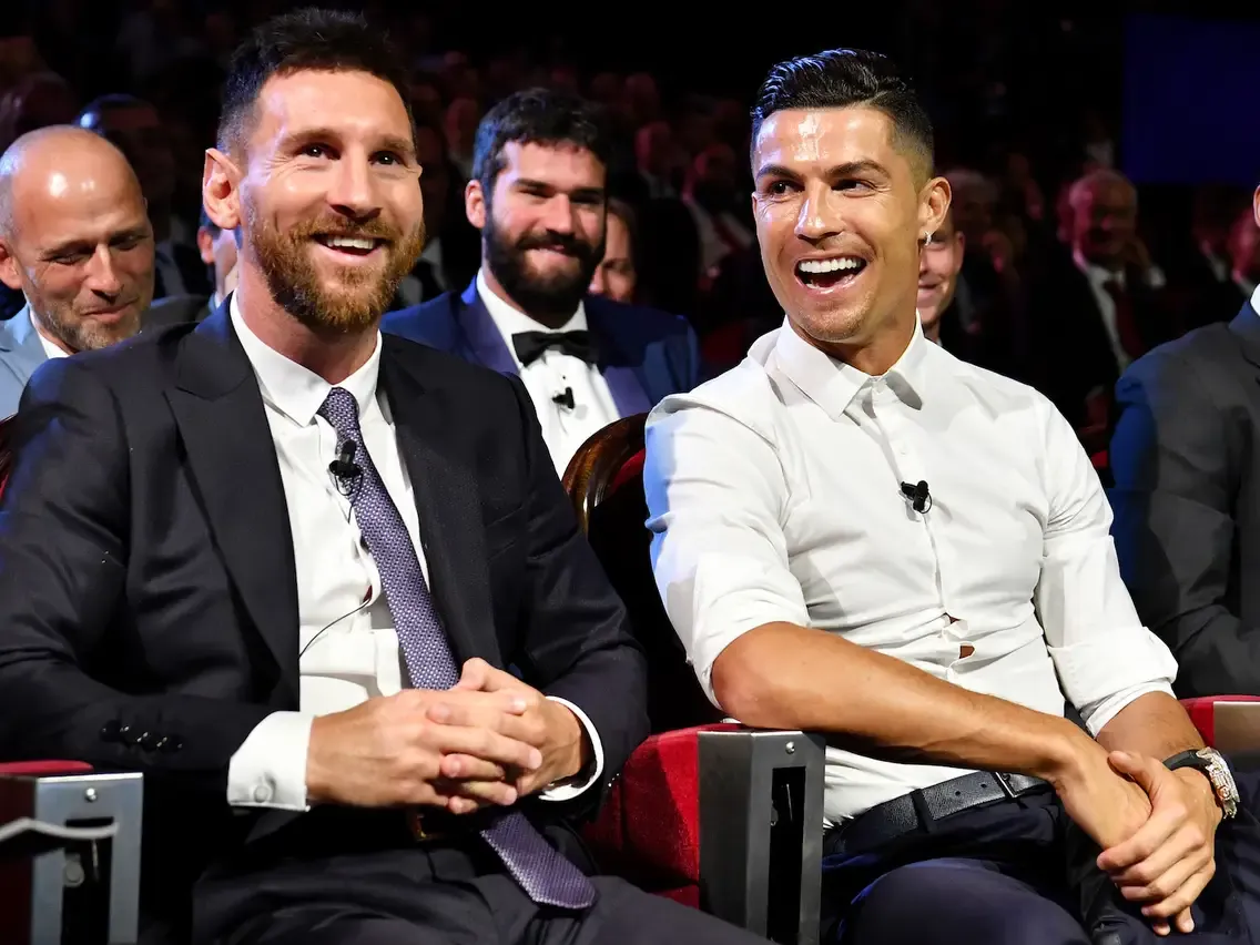 Lionel Messi and Cristiano Ronaldo during a Ballon d'Or show - sportzpoint.com