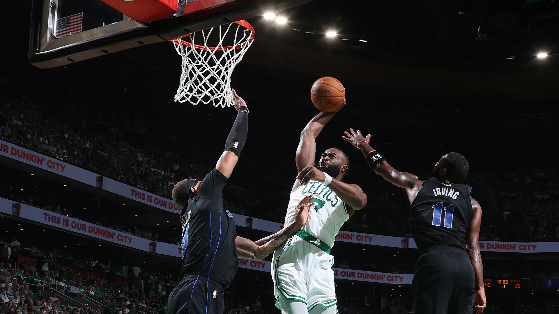 Jaylen Brown dunking - sportzpoint.com