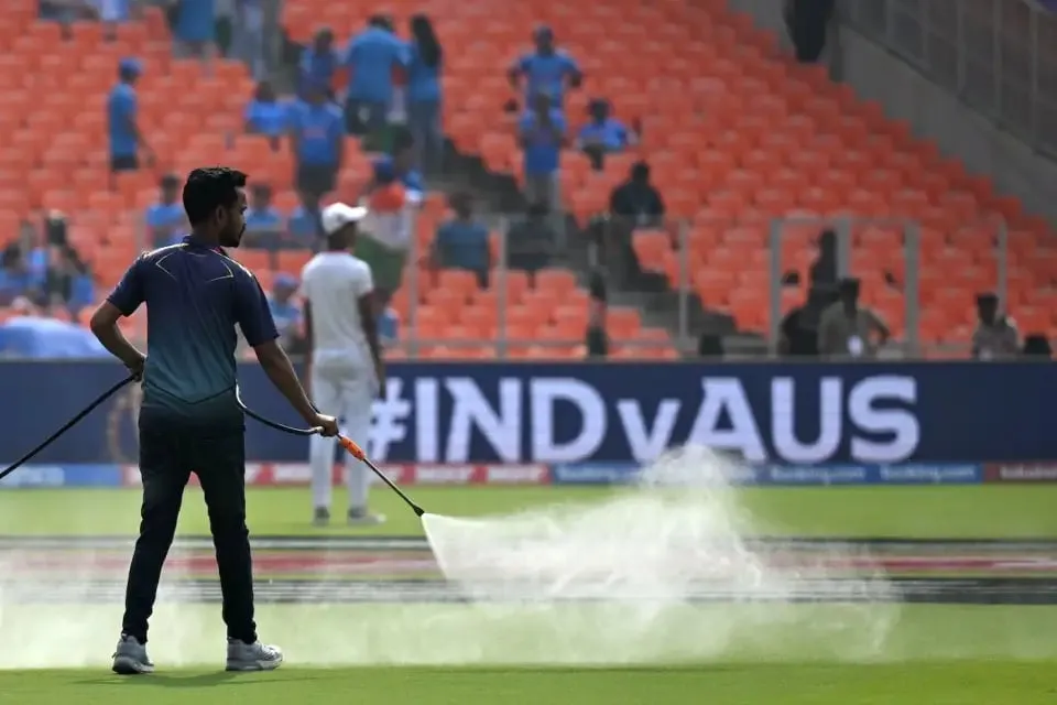 The ground gets its dose of the anti-dew spray  AFP/Getty Images