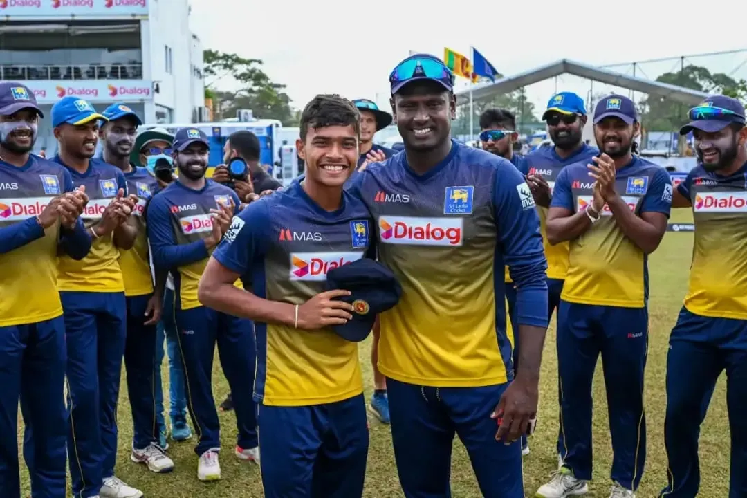 Dunith Wellalage receiving his Test cap from Angelo Mathews | Sportz Point