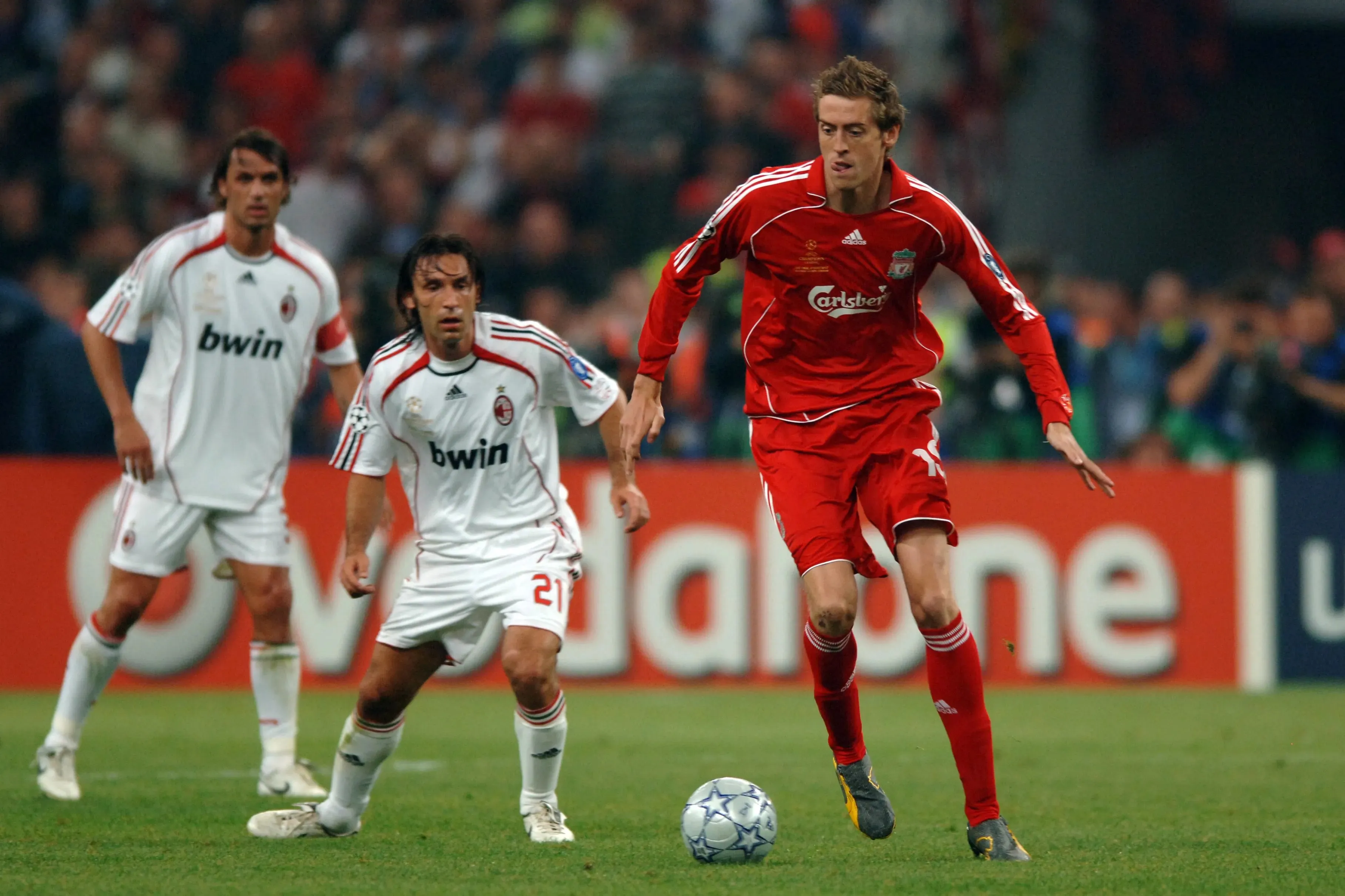 Peter Crouch playing for Liverpool FC in an UEFA Champions League game.  