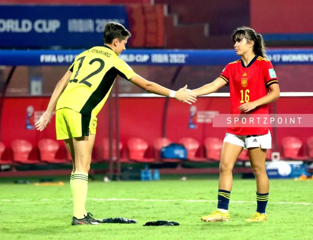 Germany vs Spain | German goalkeeper Lina Altenburng shakes her hand with Spain's Cristina Libran after their hard-fought match in the semifinal of the U17 Women's World Cup. | Sportz Point