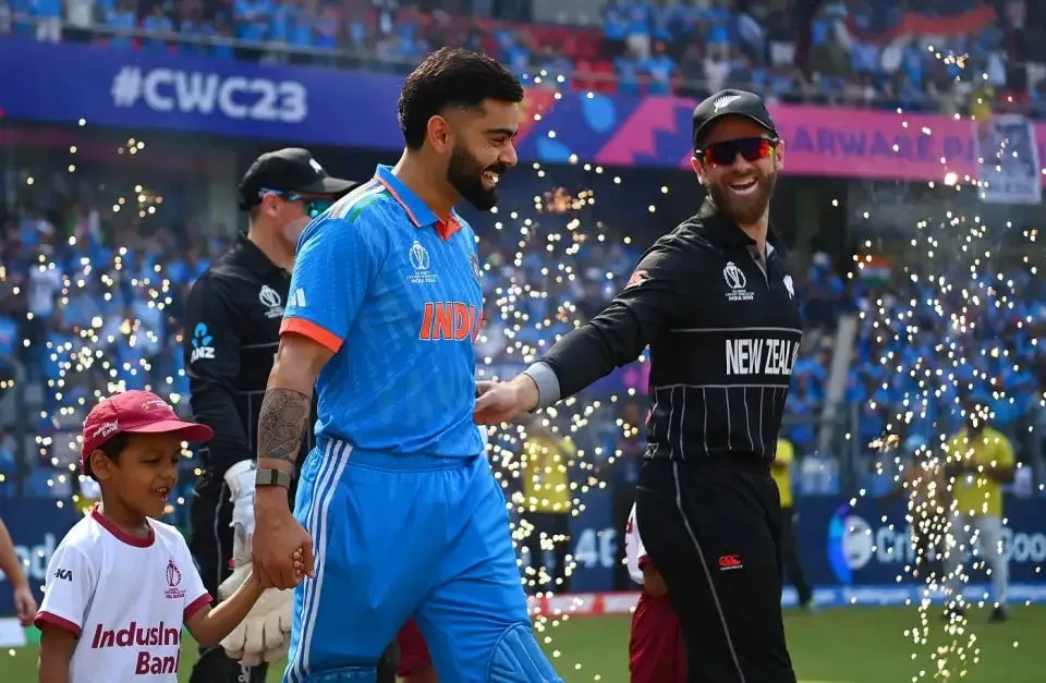 Virat Kohli and Kane Williamson share a moment as they walk out for the anthems  Image - ICC/Getty