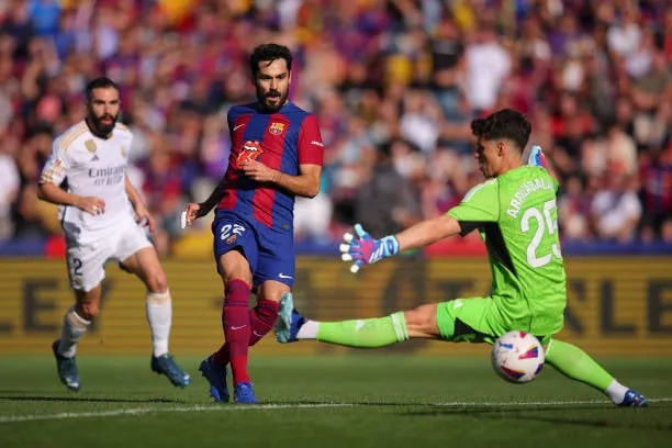 GÃ¼ndoÄan with the first goal for Barcelona  Image - Getty