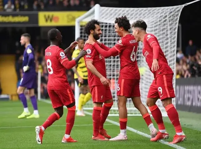 Liverpool players celebrate after scoring against Watford. | Sportz Point. 