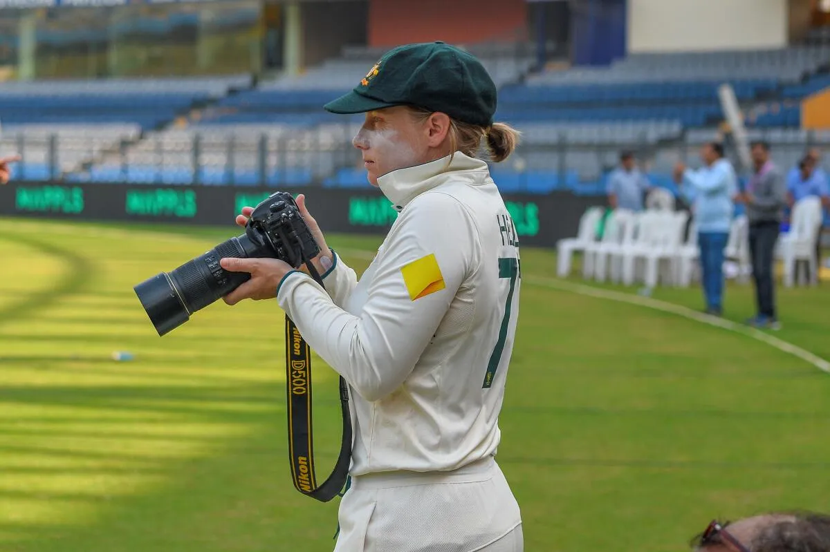 Australian Test Cricket Team captain Alyssa Healy taking a picture of victourious Indian Test team in Mumbai.  Image | Emmanual Yogini/ Hindu