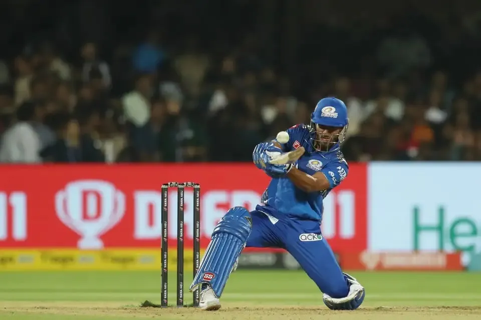 RCB vs MI: Tilak Varma raises his bat after reaching a well-deserved half-century | Sportz Point