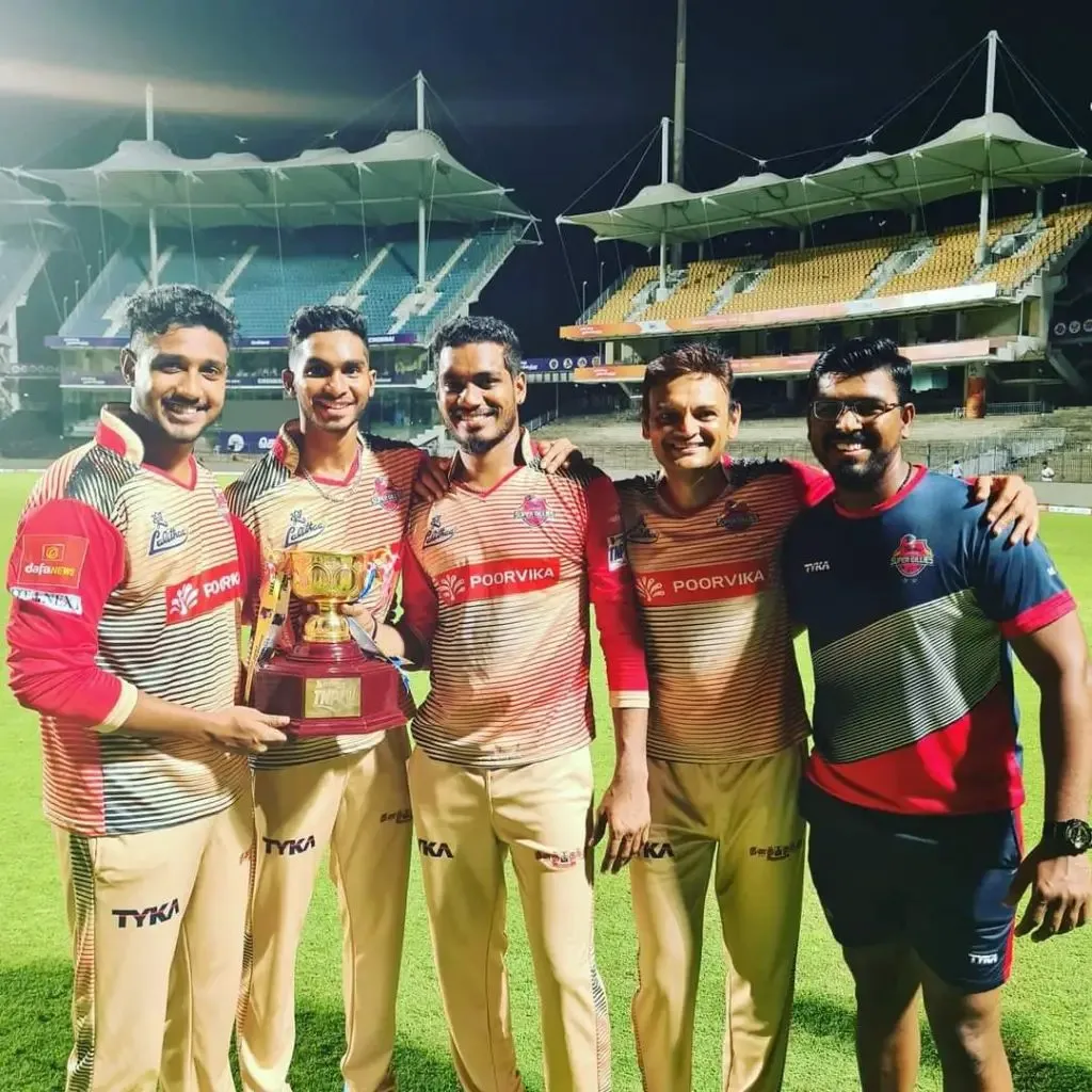 B. Arun (leftmost in the photo) with his Super Gillies teammates after winning the TNPL 2021.│Cricket News │ SportzPoint