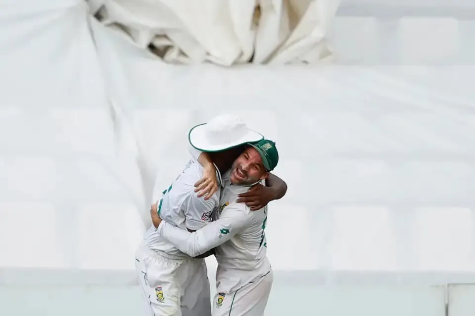 Dean Elgar gives Kagiso Rabada a bear hug after South Africa's innings win  Image - AFP/Getty