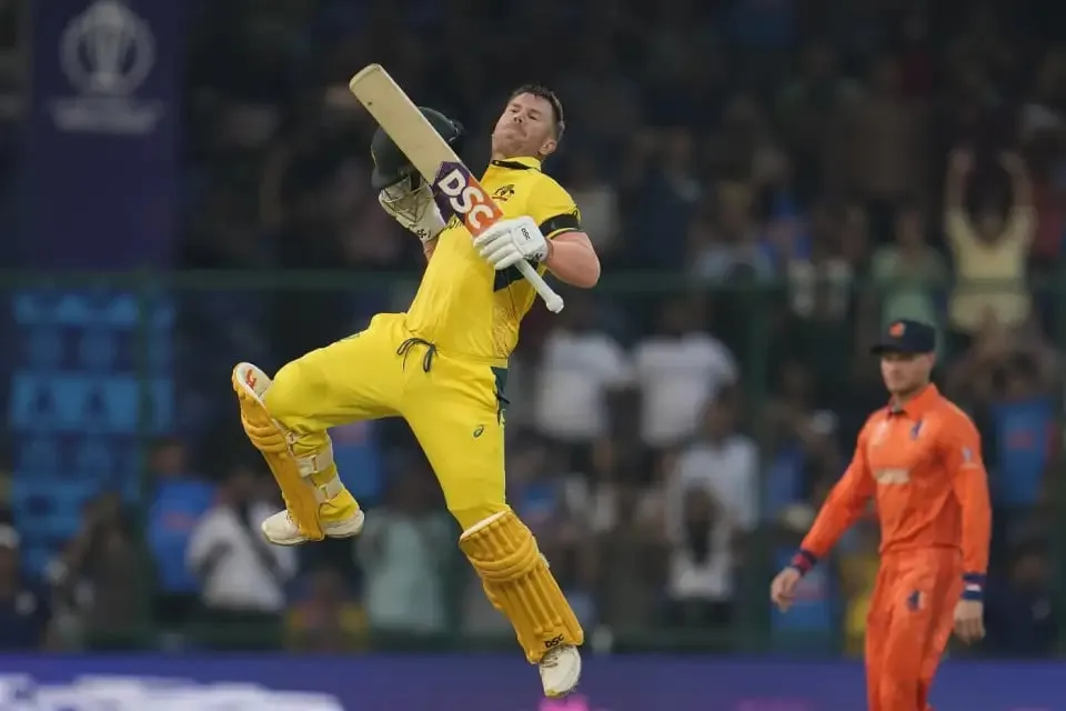 David Warner celebrates after scoring the century against Netherlands in the 2023 World Cup  Image - Associated Press