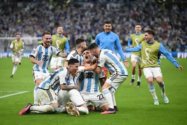 Argentina players in joy after Lautaro Martinez scored the last penalty of the match.  Image | FIFA