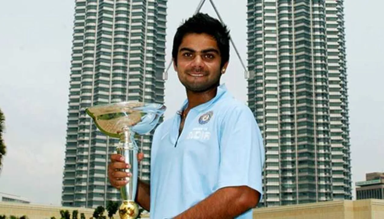 Virat Kohli with the 2008 ICC U19 World Cup trophy.  