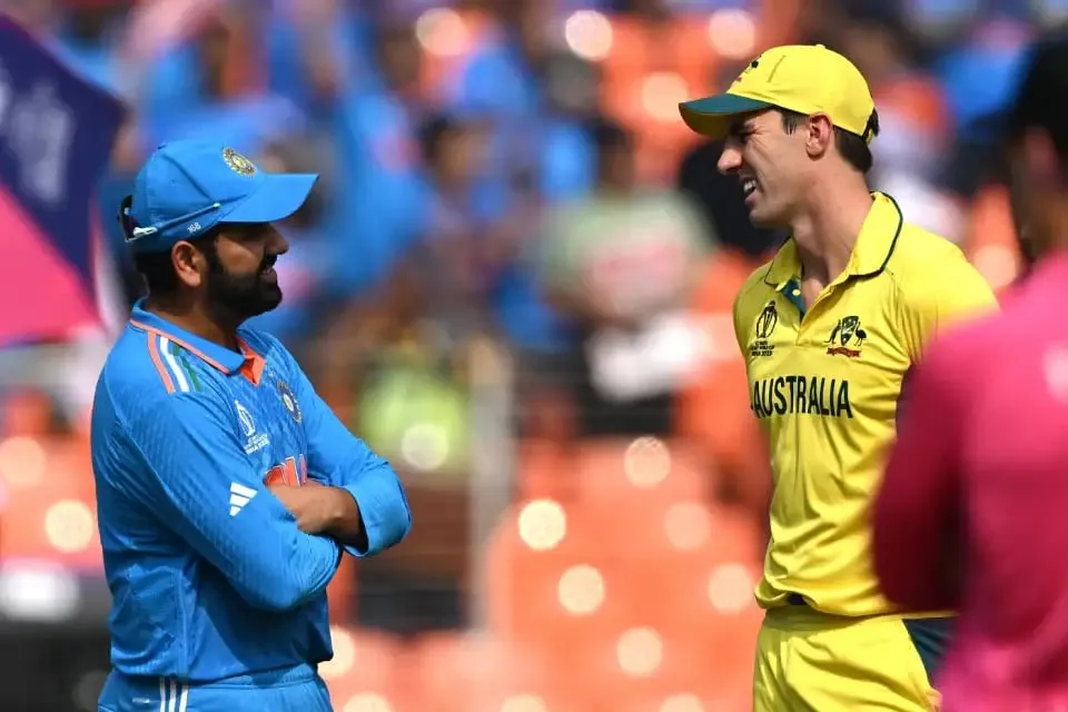 Rohit Sharma and Pat Cummins chat at the toss  AFP/Getty Images