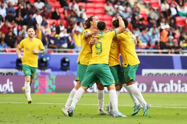 AFC Asian Cup 2024: Jackson Irvine celebrating the opening goal with his teammates  Image - Getty
