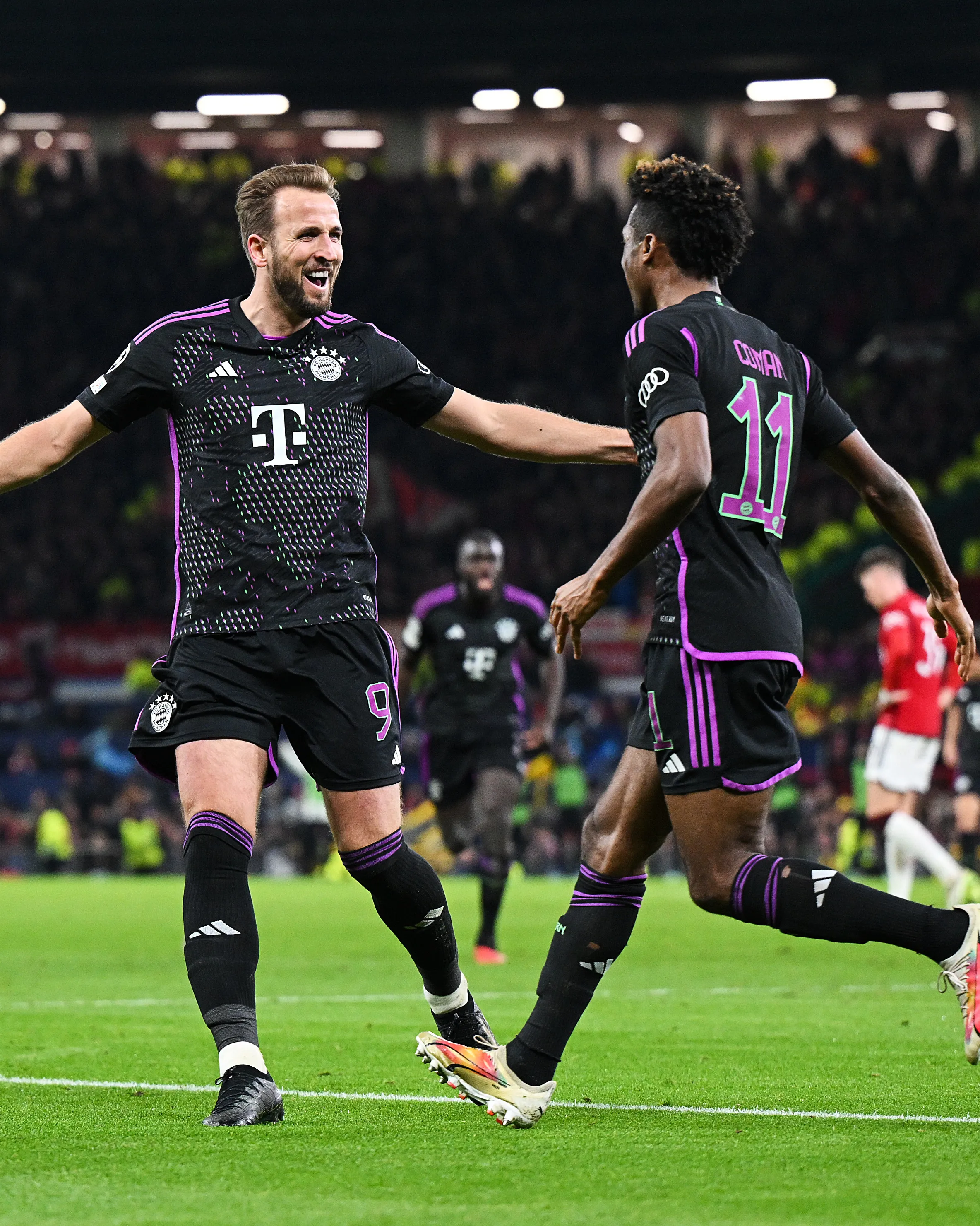 Harry Kane and Coman celebrate the first goal of the Manchester United vs Bayern Munich match in Champions League.  Image | UEFA