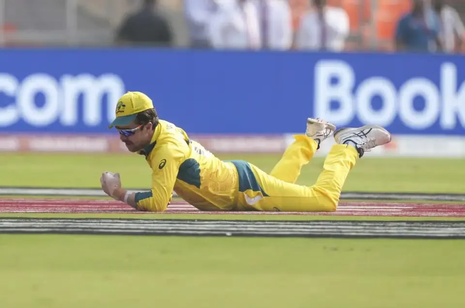 Travis Head picked a truly stunning catch that saw the back of Rohit Sharma  Associated Press