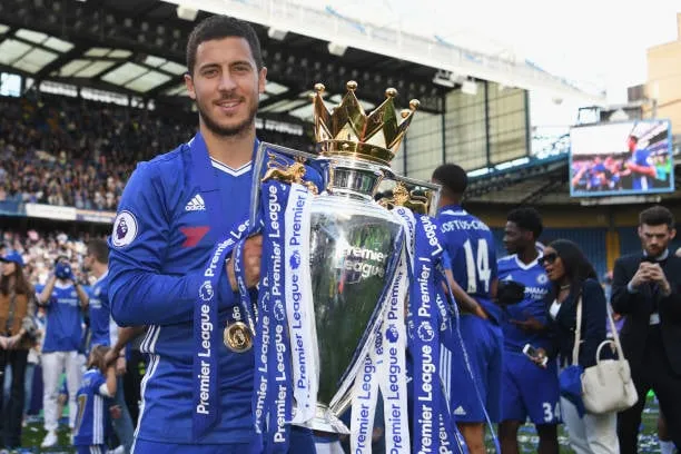 LONDON, ENGLAND - MAY 21: Eden Hazard of Chelsea poses with the Premier League trophy after the Premier League match between Chelsea and Sunderland at Stamford Bridge on May 21, 2017 in London, England. (Photo by Michael Regan/Getty Images)  