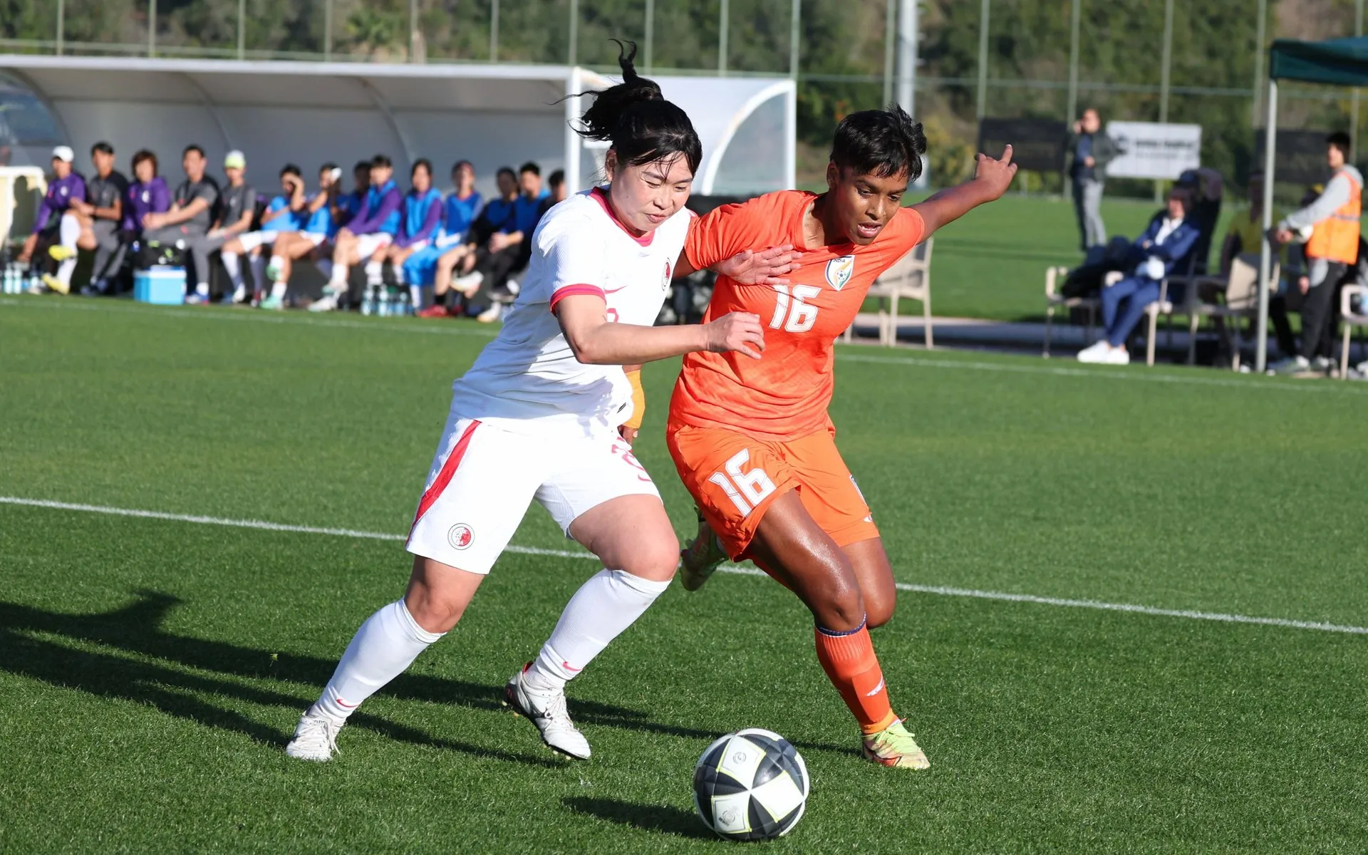 India's Manisha Kalyan fighting for a ball against Hong Kong in Turkish Women's Cup 2024  Image | AIFF Media