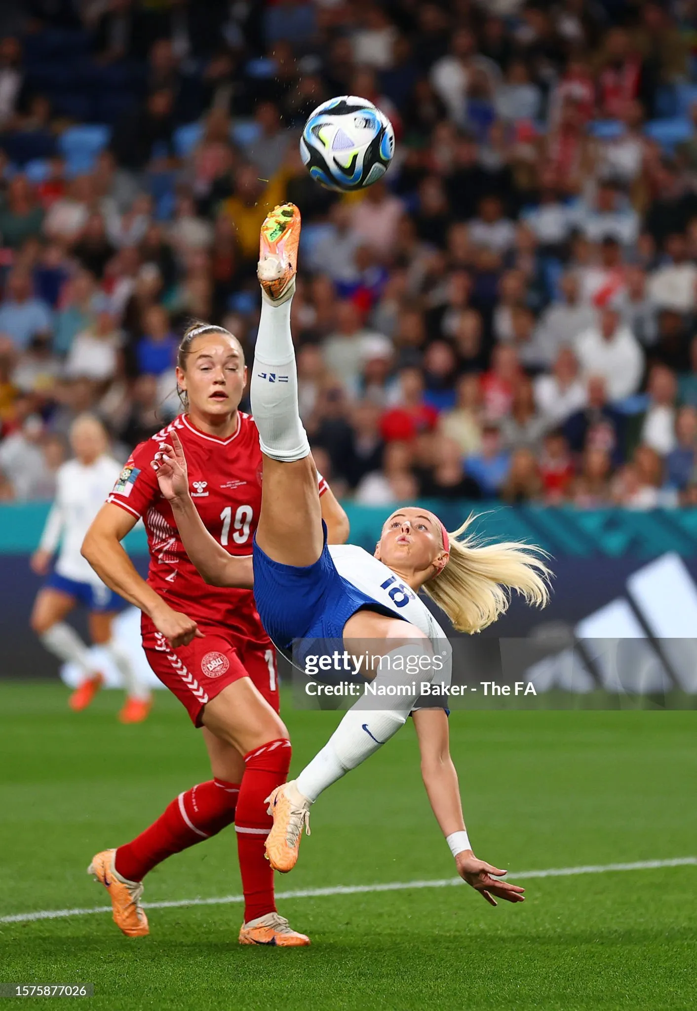Chloe Kelly of England performs a bicycle kick during the FIFA Women's World Cup Australia & New Zealand 2023 Group D match between England and Denmark at Sydney Football Stadium on July 28, 2023 in Sydney, Australia.   Photo by Naomi Baker - The FA/The FA via Getty Images