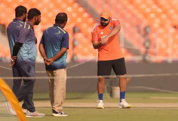 Rohit Sharma is having a chat with the Ground staffs  Getty Images