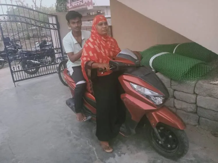 Corona outbreak Telangana mom makes 1400-km round-trip on scooty to bring her son home