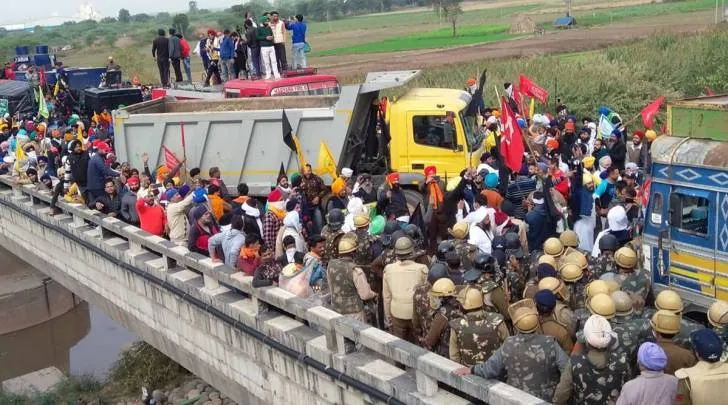 ‘Delhi Chalo’ against farm laws: Farmers cross barricades, water jets; Tomar, Rajnath offer talks