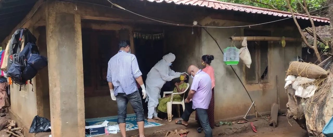  Kerala doctors cross river trek several kilometres to reach tribal village