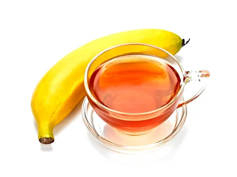 Cup of Tea and Banana Isolated on White.Shot with Hasselblad