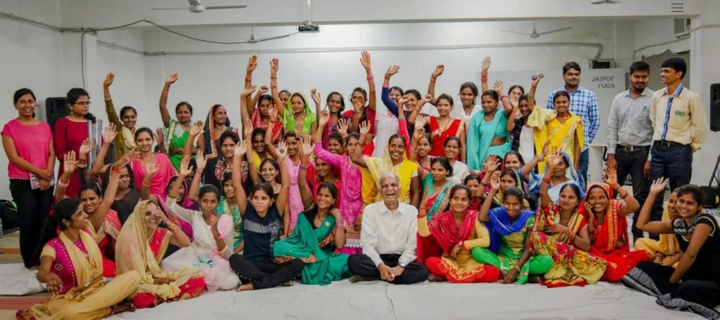 Nand Kishore Chaudhary with Jaipur Rugs Weavers