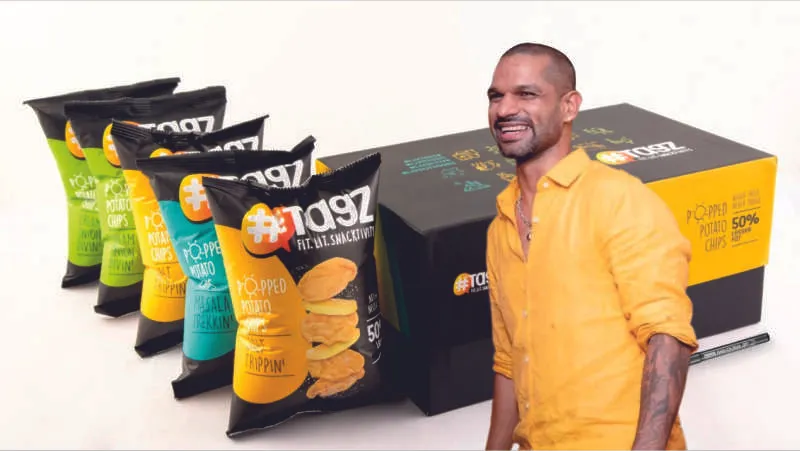 Tagz Foods is a snack brand that sells cholesterol- and fat-free healthy snacks. Shikhar Dhawan, a cricket player, has joined snack company Tagz Foods as an investor and a brand ambassador.