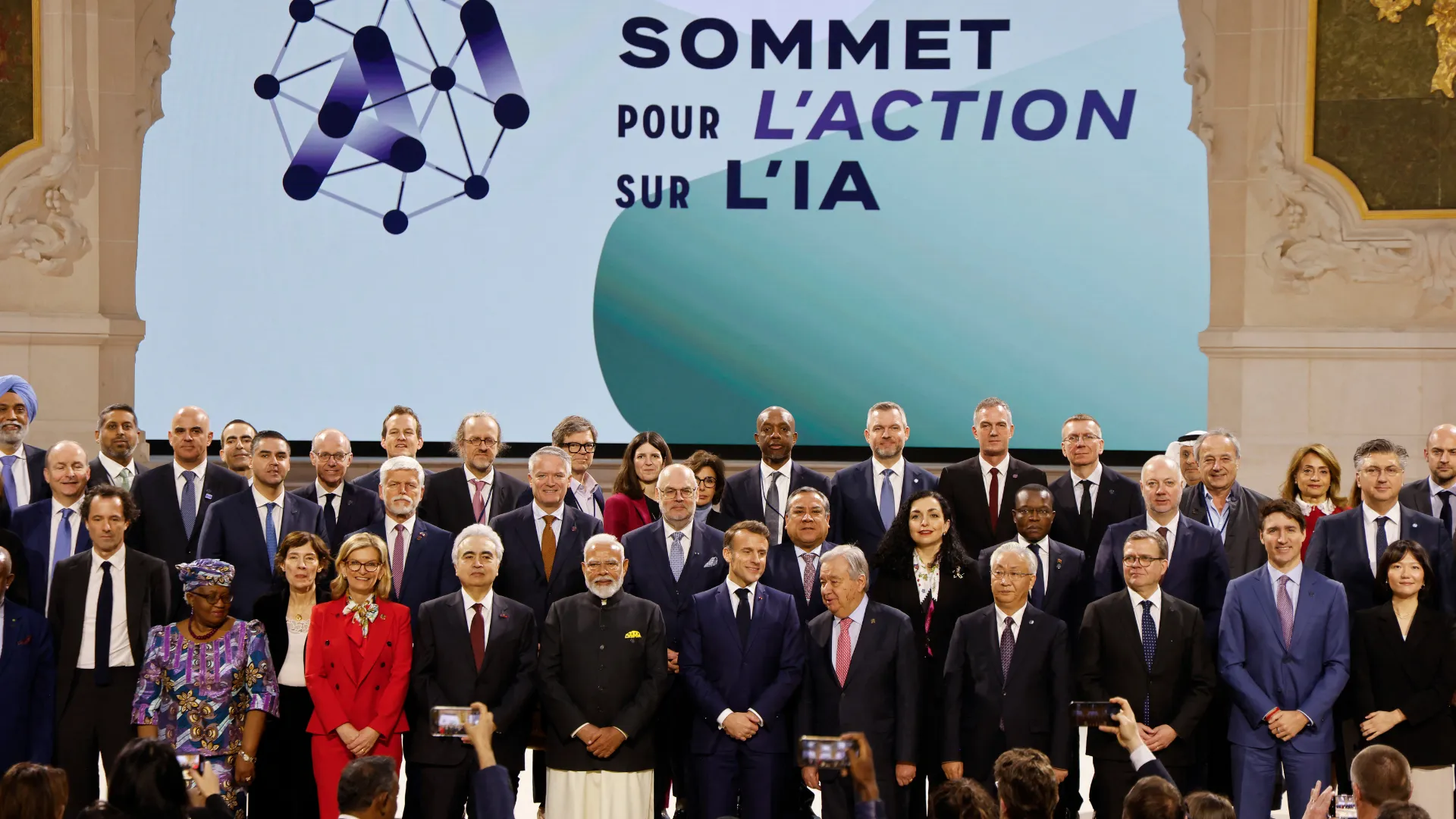  France's President Emmanuel Macron (front C) poses for a group picture with world leaders and attendees at the end of the plenary session of the Artificial Intelligence (AI) Action Summit, at the Grand Palais, in Paris, on February 11, 2025. Photograph: (AFP) 
