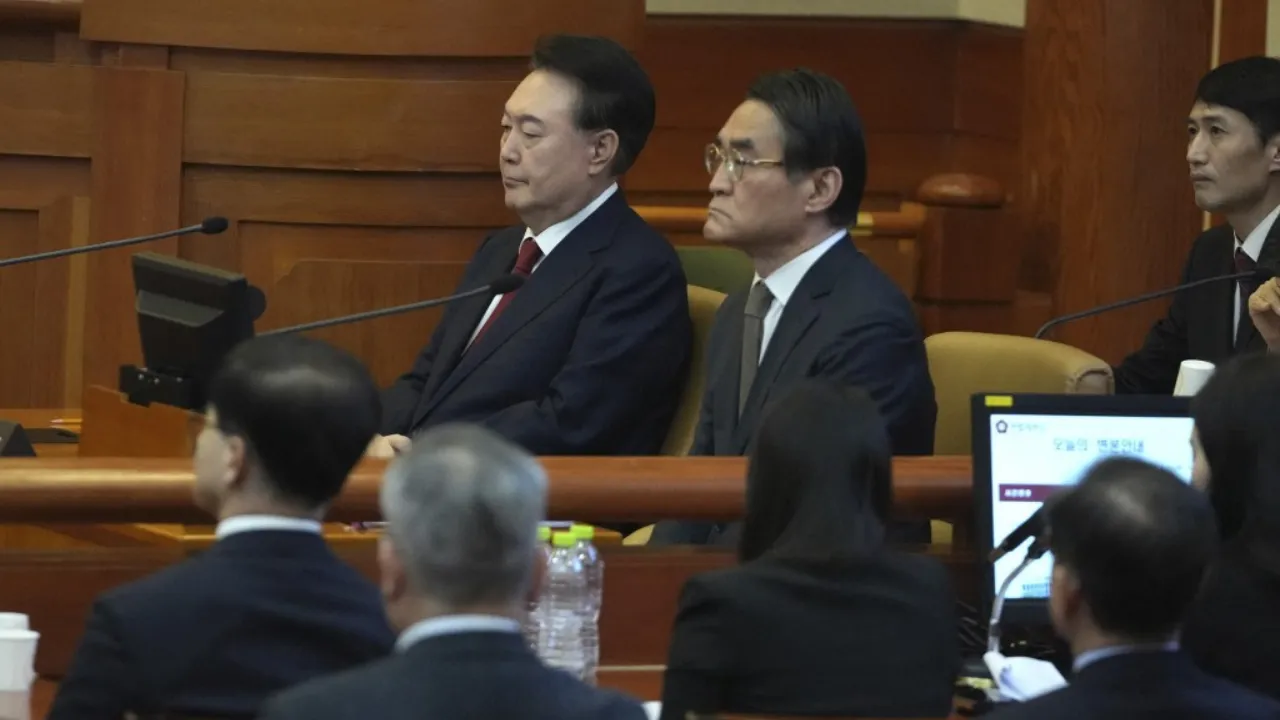  South Korea's impeached President Yoon Suk Yeol (top L) attends a hearing of his impeachment trial over his short-lived imposition of martial law at the Constitutional Court in Seoul on February 11, 2025. Photograph: (AFP) 