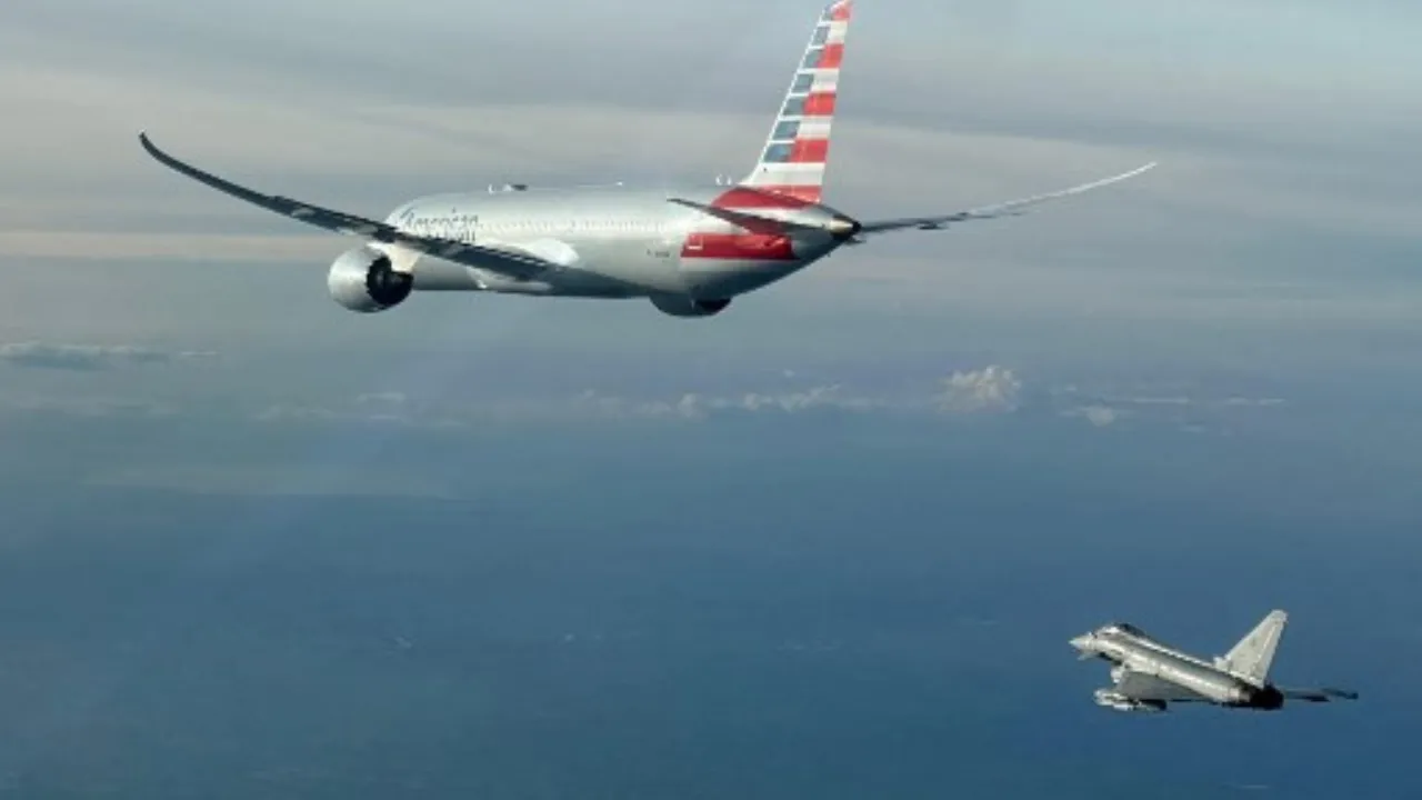  This handout picture taken and released by the Italian Air Force - Aeronautica Militare on February 23, 2025 shows an American Airlines flight being escorted by an Eurofighter from the Italian Air Force.  Photograph: (AFP) 