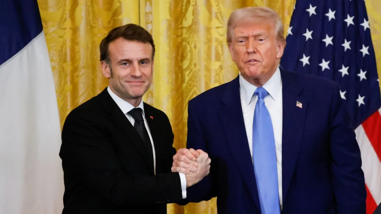  US President Donald Trump and French President Emmanuel Macron shake hands at the end of a joint press conference in the East Room to the White House in Washington, DC, on February 24, 2025. Photograph: (AFP) 
