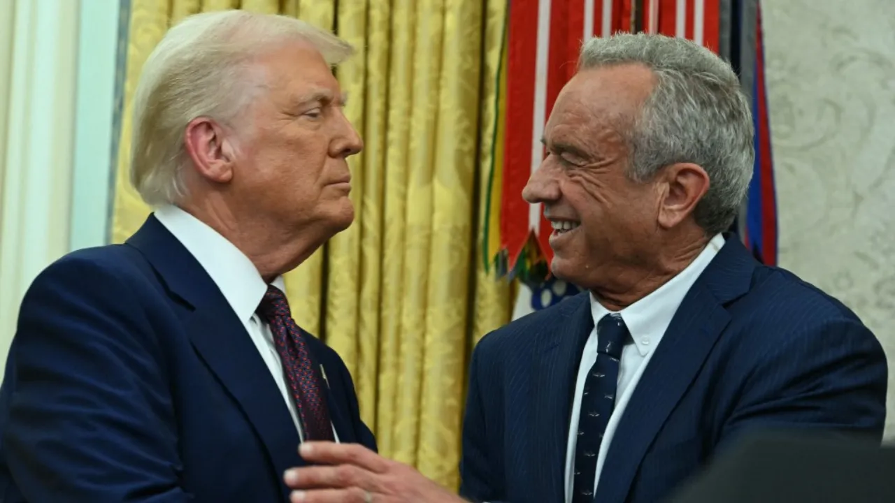  File Photo: The new US Secretary of Health and Human Services Robert F. Kennedy Jr., shakes hands with US President Donald Trump after a swearing in ceremony in the Oval Office of the White House in Washington, DC, on February 13, 2025. Photograph: (AFP) 
