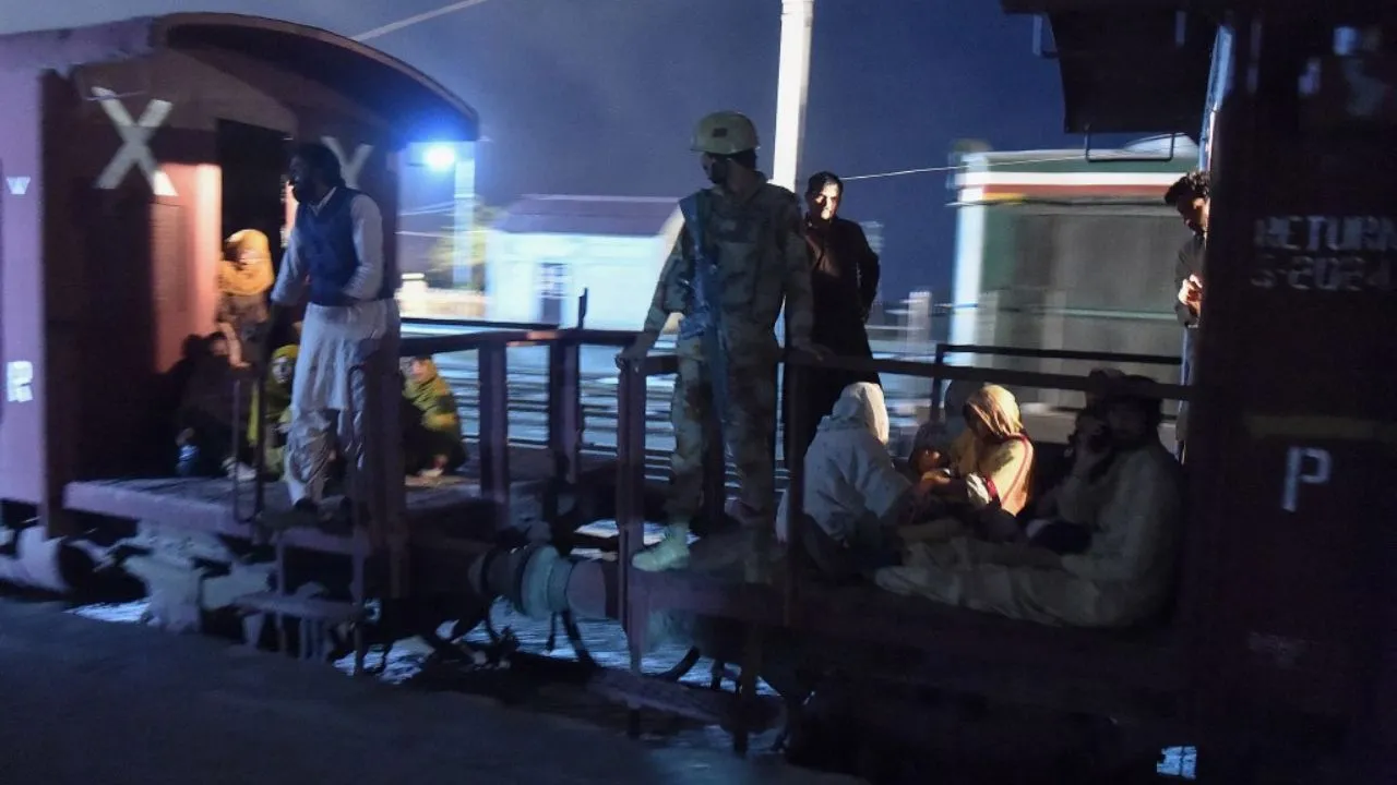  A soldier works to evacuate freed train passengers following a security operation against armed militants who ambushed the train in the remote mountainous area, in Mach, southwestern Balochistan province on March 11, 2025. Photograph: (AFP) 