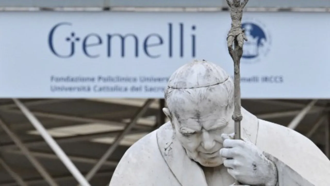  A picture shows the statue of John Paul II at the entrance of the Gemelli University Hospital where Pope Francis is hospitalized with pneumonia, in Rome.  Photograph: (AFP) 