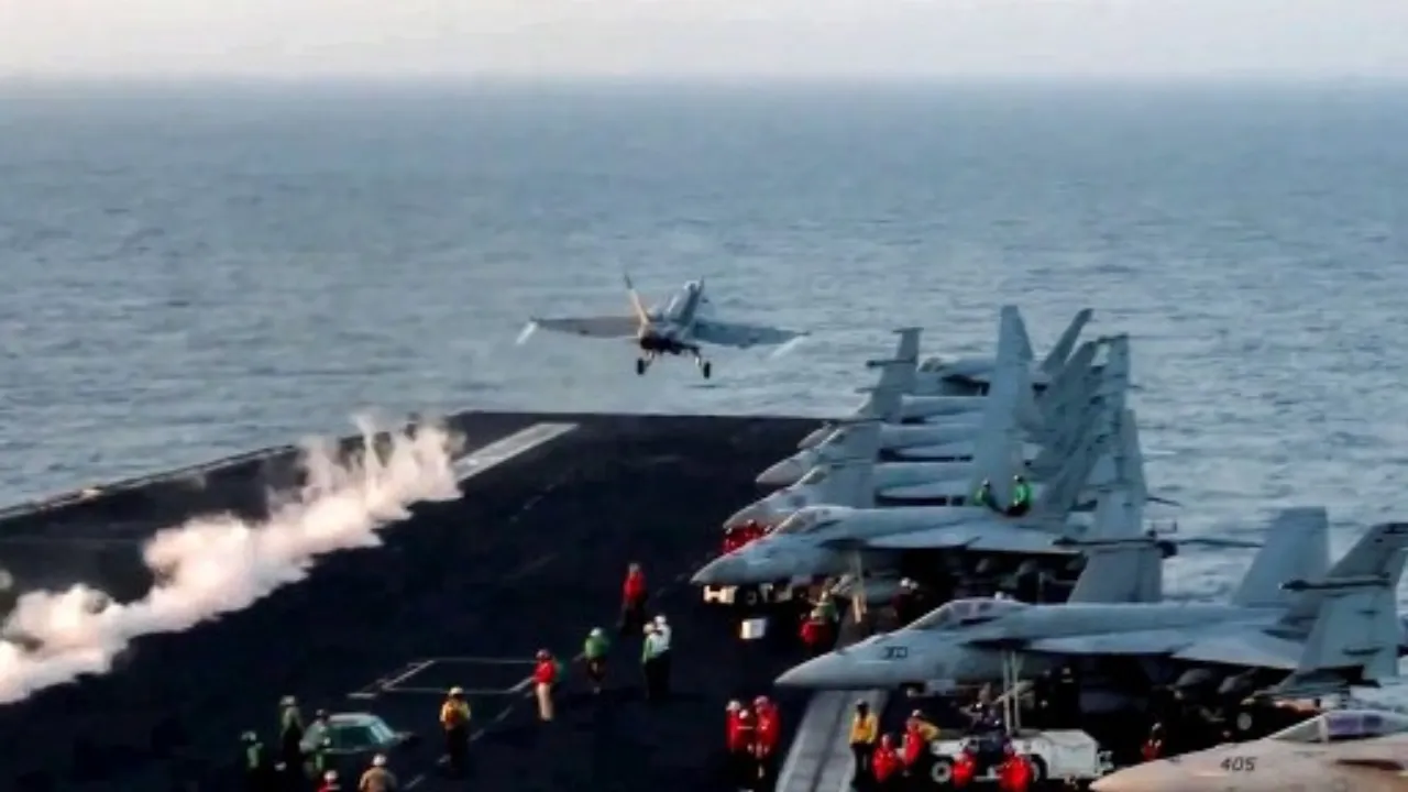  This grab from footage shared by the US Central Command (CENTCOM) on March 15, 2025 shows a US F/A-18 fighter aircraft taking off from an aircraft carrier at sea reportedly amidst operations launched against Huthis in Yemen. Photograph: (AFP) 