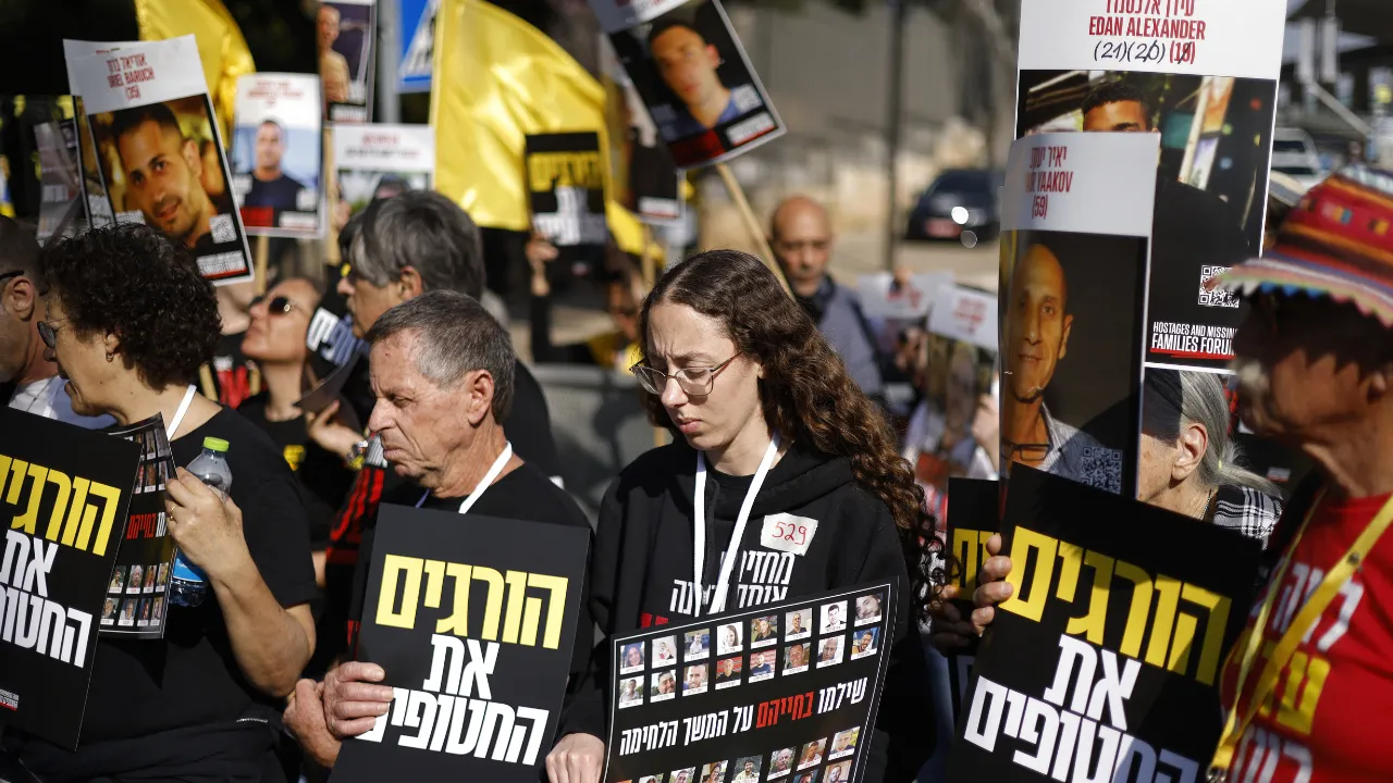  Relatives and supporters of Israeli hostages held captive in the Gaza Strip since the October 2023 attacks by Palestinian militants, hold their portraits during a protest outside the Israeli parliament (Knesset) calling for action to secure their release Photograph: (AFP) 