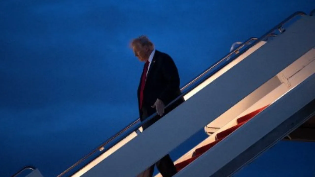  US President Donald Trump steps off Air Force One at Joint Base Andrews, Maryland, on March 30, 2025. Photograph: (AFP) 