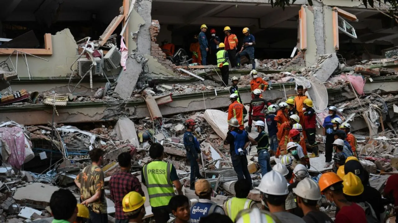  Rescue teams work to evacuate residents trapped under the rubble of the collapsed building 'Sky Villa Condominium development' in Mandalay on March 30, 2025. Photograph: (AFP) 