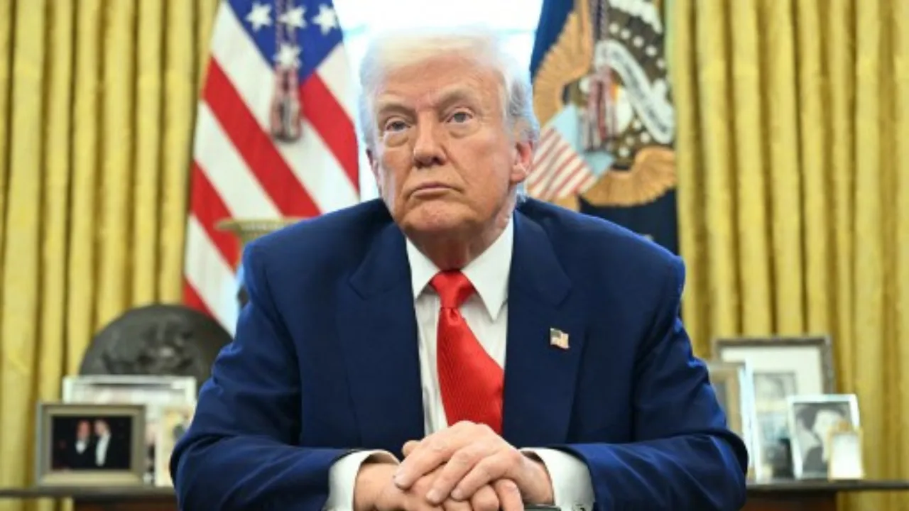  US President Donald Trump looks on after signing an executive order in the Oval Office of the White House on April 9, 2025 in Washington, DC. Photograph: (AFP) 