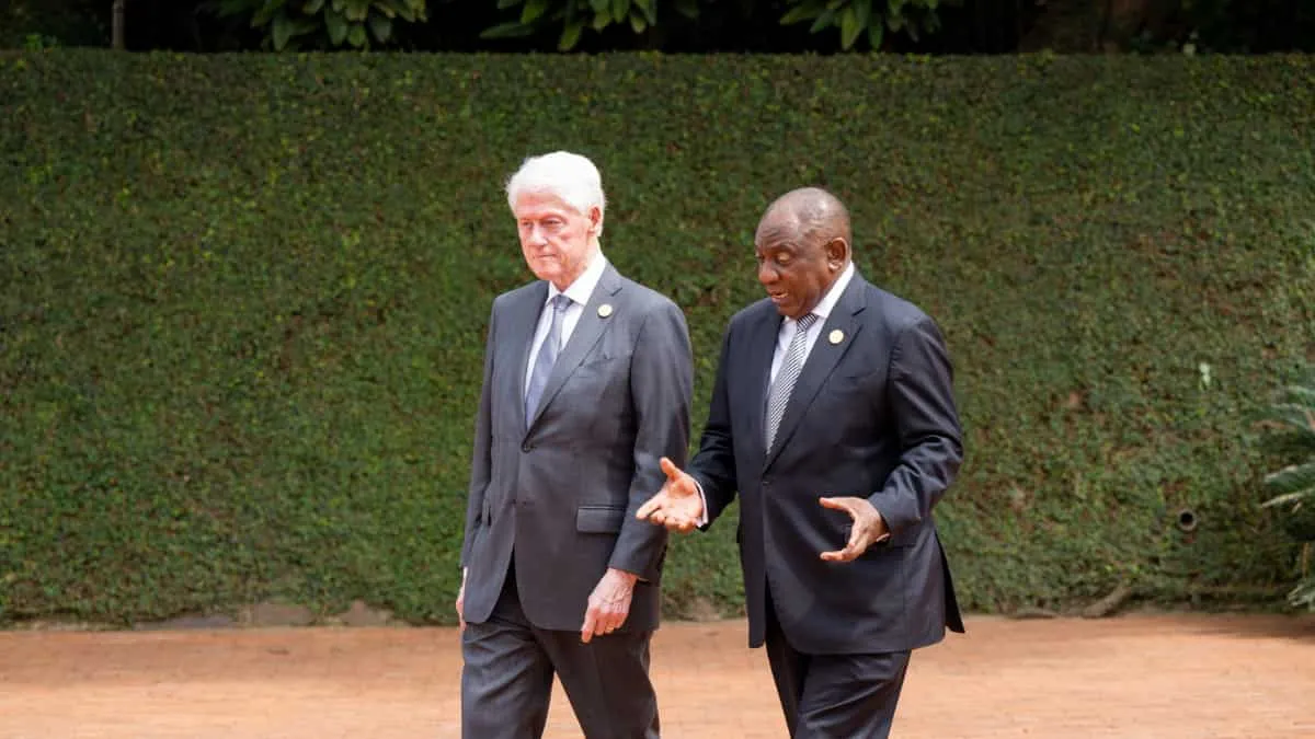 Former US President Bill Clinton with South Africa's President Cyril Ramaphosa 
