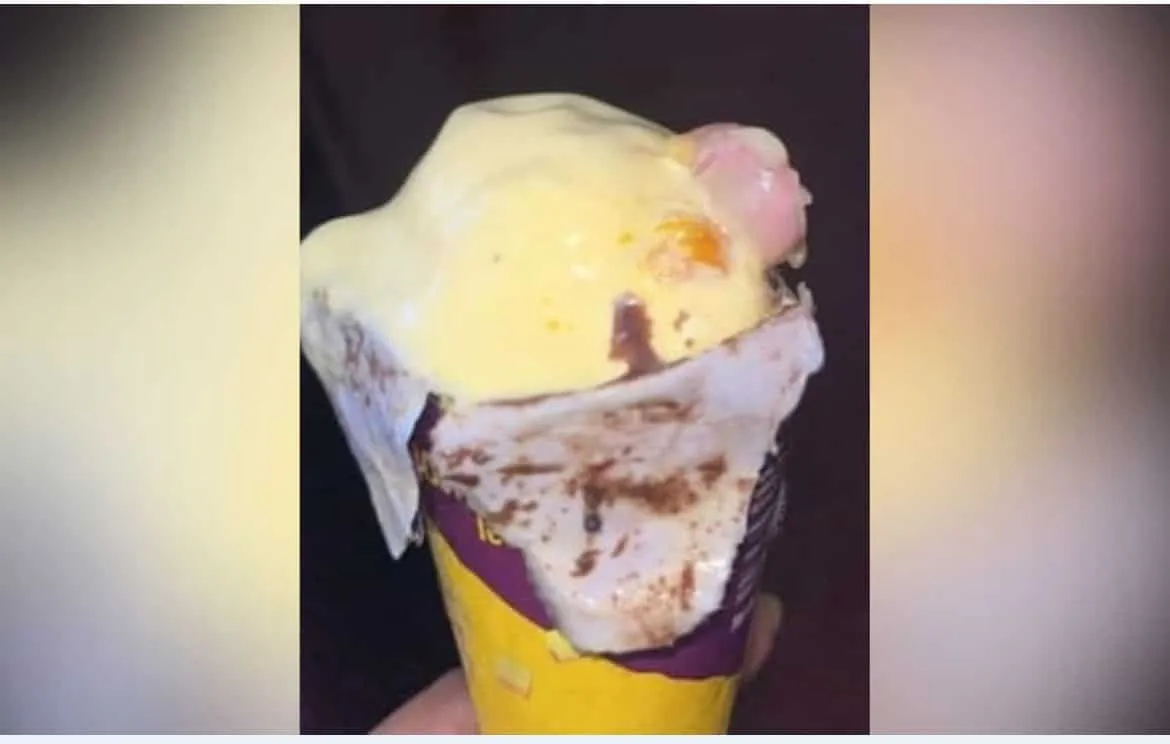 Ice cream cone with human finger 