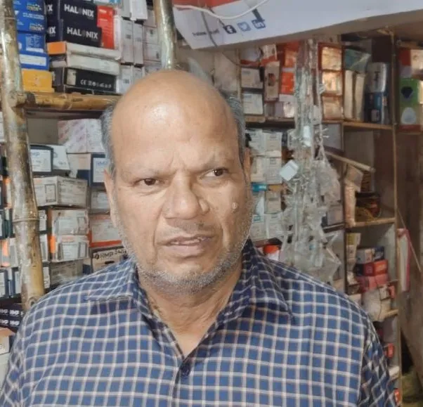 कि